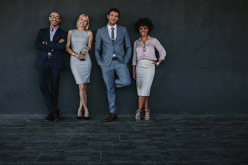 Multiracial team of business professionals standing together