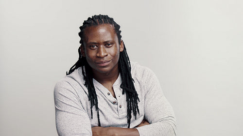 Smiling african guy with dreadlocks