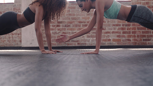 Partner planks with claps