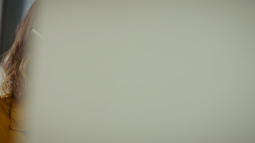 Customer service agent in headset actively listens and engages in a conversation