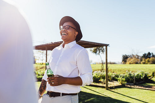 African man laughing during a party