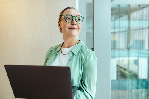 Young professional woman with laptop