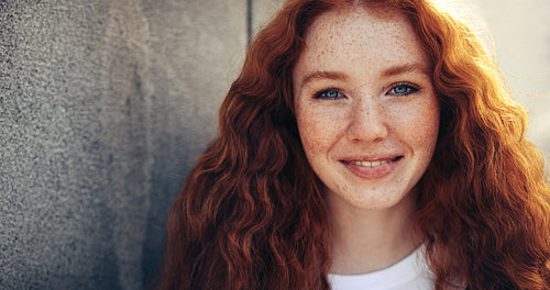 Female student at university smiling