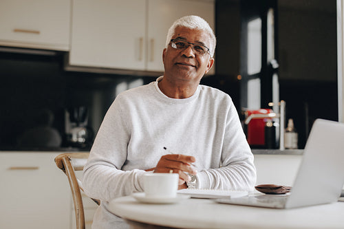 Mature entrepreneur working from home