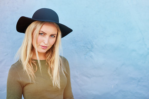 Stylish young female model with hat