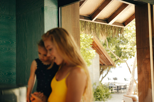 Joyful family enjoying a luxury vacation in tropical paradise