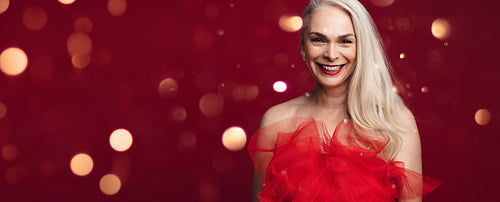 Attractive senior woman christmas backgound