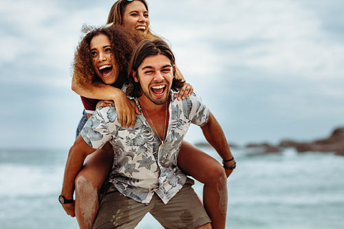 Carefree friends enjoying a day at the beach