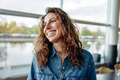 Businesswoman looking away and smiling