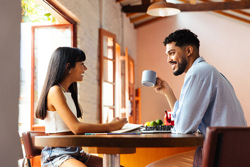 Father and daughter enjoying quality time together over morning coffee