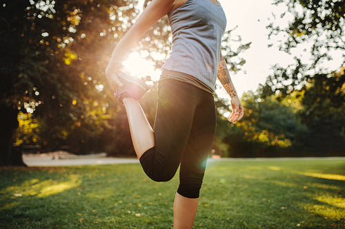 Woman exercising in the morning at city park