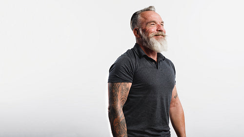 Smiling senior man with a beard