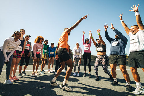 Cheerful group participating in a vibrant marathon event