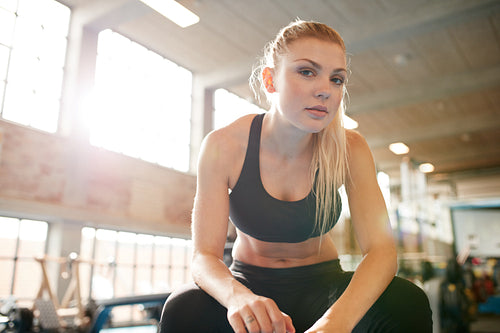 Young woman resting after workout