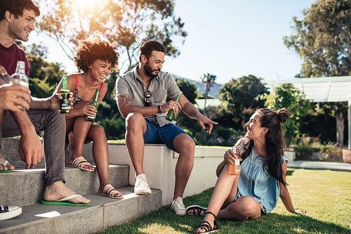 Group of friends having party outdoors