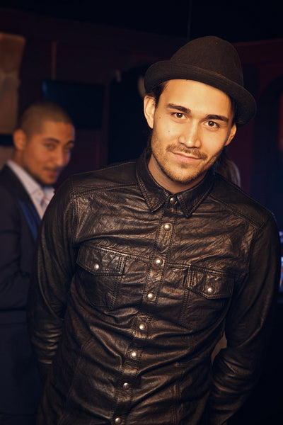 Man in Black Smiling At You