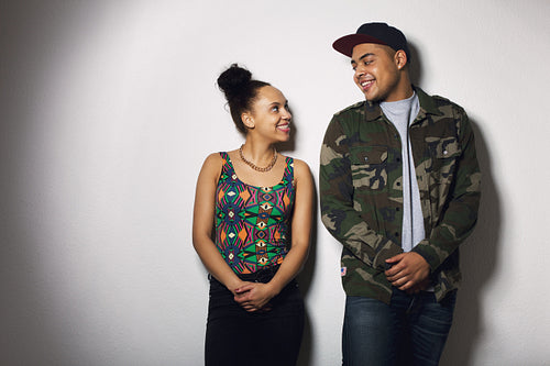 Happy young couple looking at each other