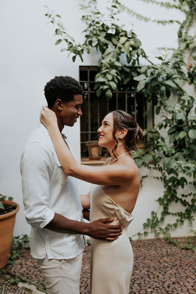 Couple sharing a romantic moment in their backyard