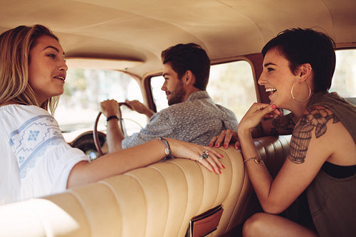 Friends enjoying on a road trip
