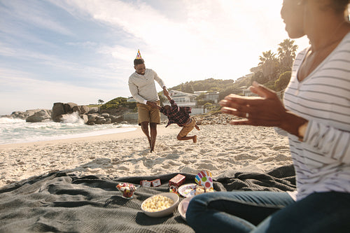Family having a great time on the beach