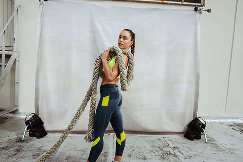 Sportswoman cross training on rooftop