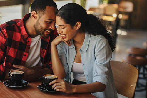 Beautiful couple on a date at cafe