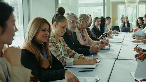 Business Professionals Collaborate At A Conference