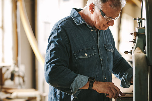 Carpentry worker working in his workshop