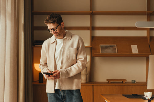 Man works in a modern bright office