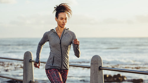 Runner exercising on the seaside promenade