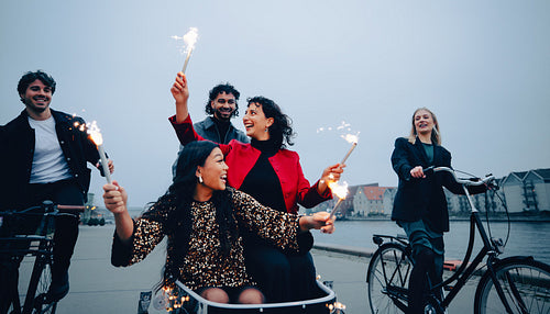 Pre-party sparkler fun with friends riding to the celebration