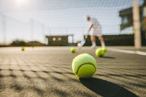 Close up of a tennis ball on ground