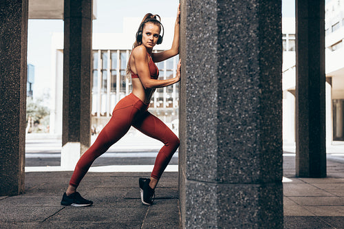 Woman doing morning workout in the city