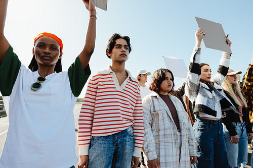 Group of young diverse individuals during a peaceful outdoor protest