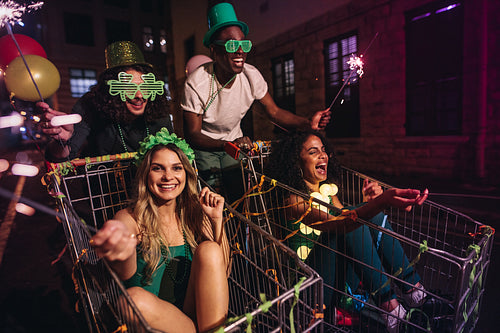 Group of people celebrating St.Patrick's days with sparklers