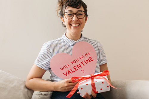 Woman with Valentine gift and card
