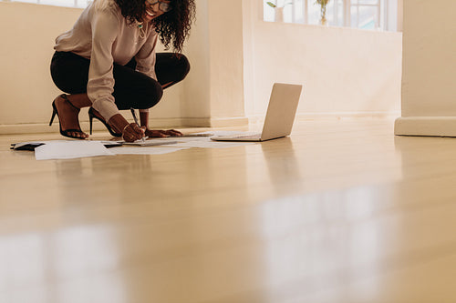 Woman entrepreneur managing business from home