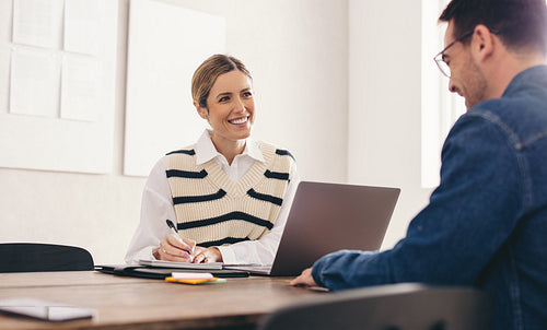 Female hiring manager interviewing a job applicant in her office