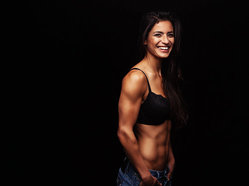 Young fit woman posing in sexy bra