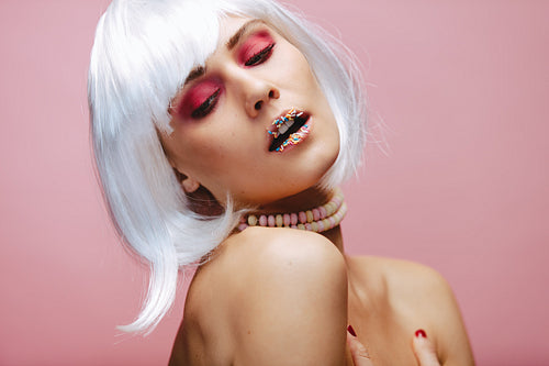 Gorgeous young model with creative makeup