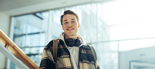 Confident male student in college campus