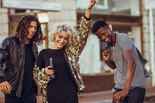 Multiracial friends having fun on the street