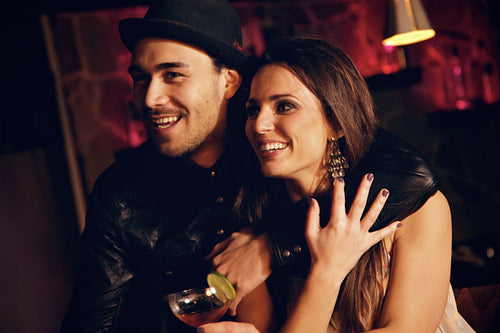 Cheerful Couple at the Club Having Fun