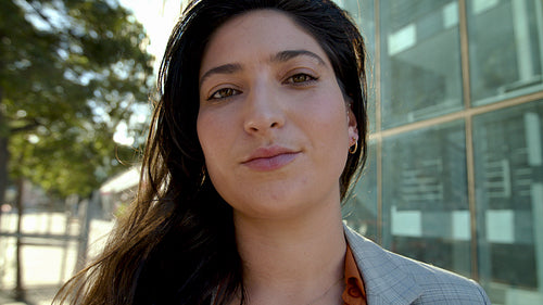 Young businesswoman standing outside