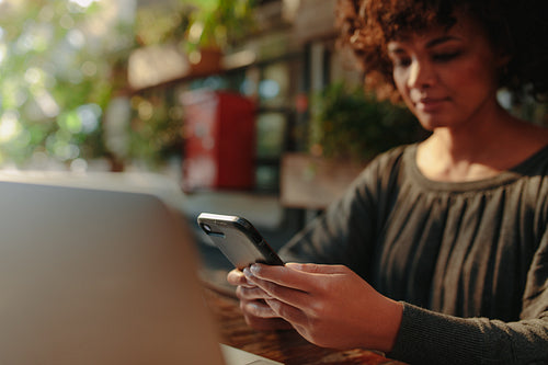 Woman looking at her mobile phone