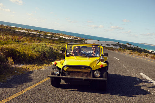 Happy young couple on road trip