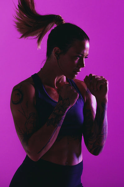 Woman practising boxing punches