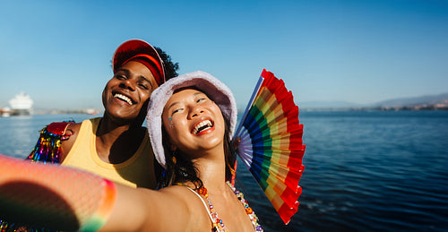 Friends at carnival by the sea