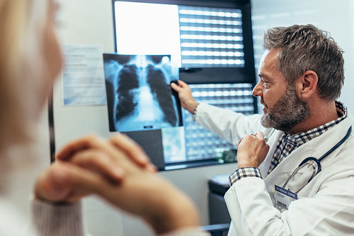 Doctor discussing scan results with patient