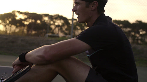 Tennis player getting ready for new game